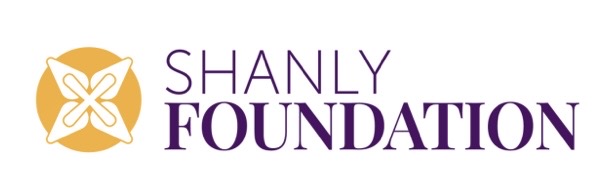 Shanly Foundation logo: orange circular emblem with a white flower-like symbol, followed by purple 'SHANLY FOUNDATION' text.